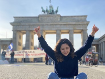 Photo of a girl in front of Brandenburg Gate